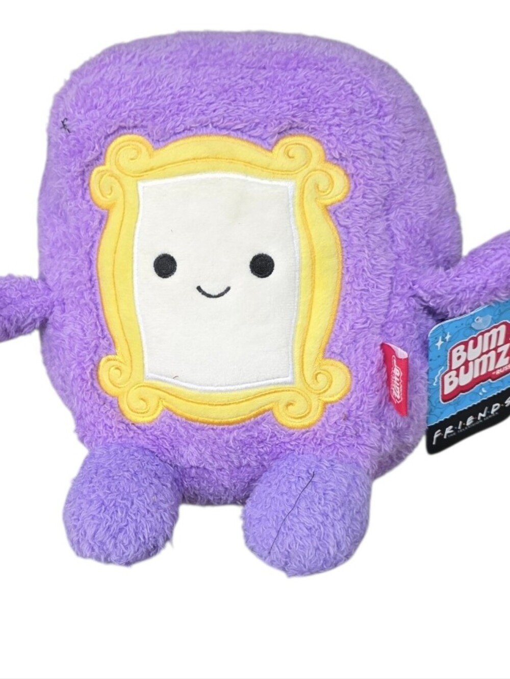 NWT FRIENDS Purple Plush Frame Character with Yellow Trim